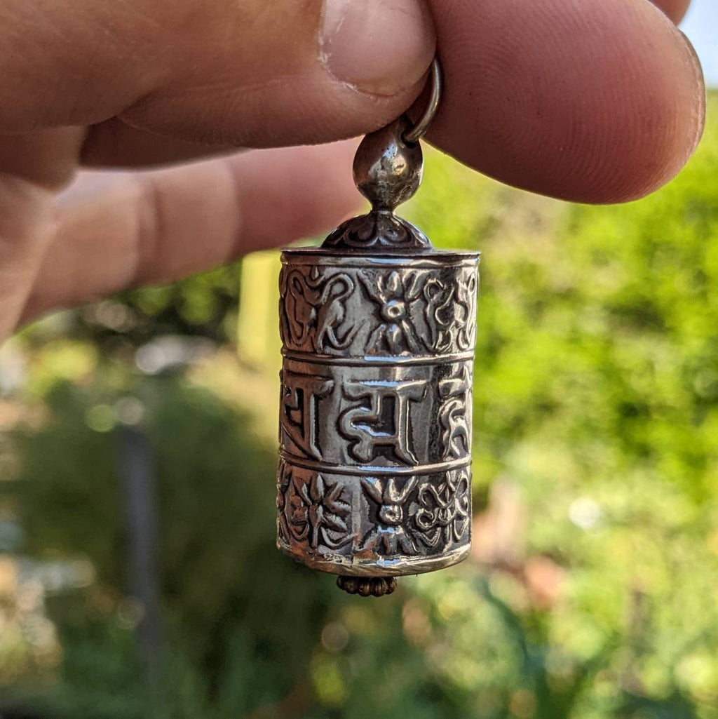 Hand made Tibetan Om Mantra carved prayer wheel Key or charm pendant
