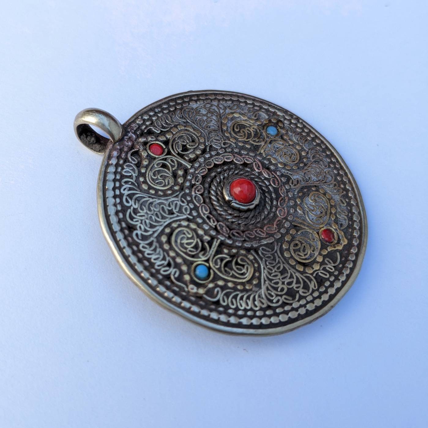 Tibetan Dorjee Mandala Pendant: Brass Copper Filigree with Coral