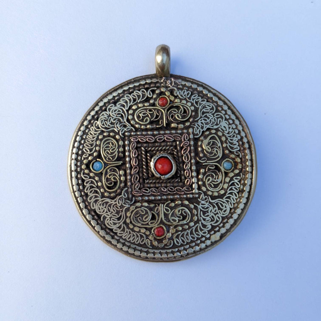 Tibetan Dorjee Mandala Pendant: Brass Copper Filigree with Coral