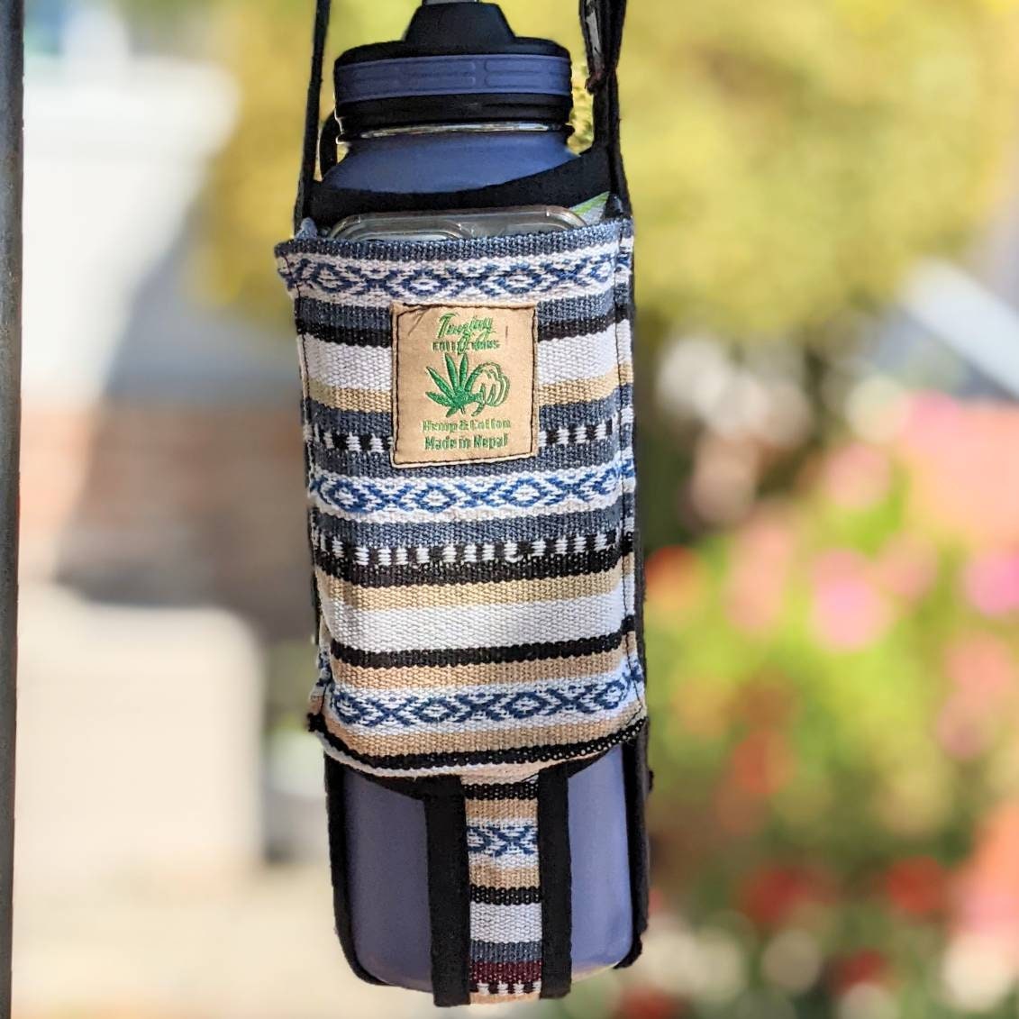 Water bottle holder and phone Pocket or small change Pocket