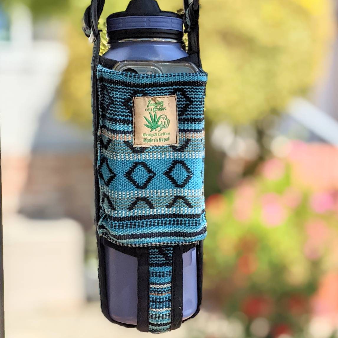 Water bottle holder and phone Pocket or small change Pocket