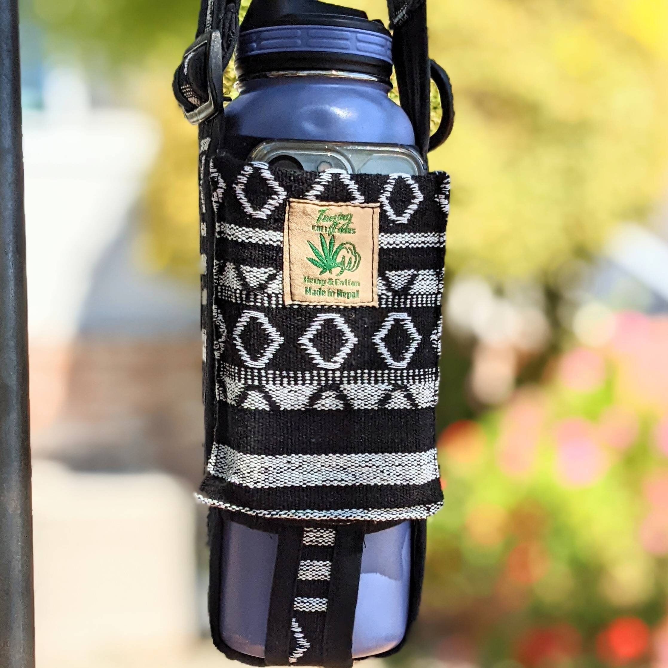 Water bottle holder and phone Pocket or small change Pocket