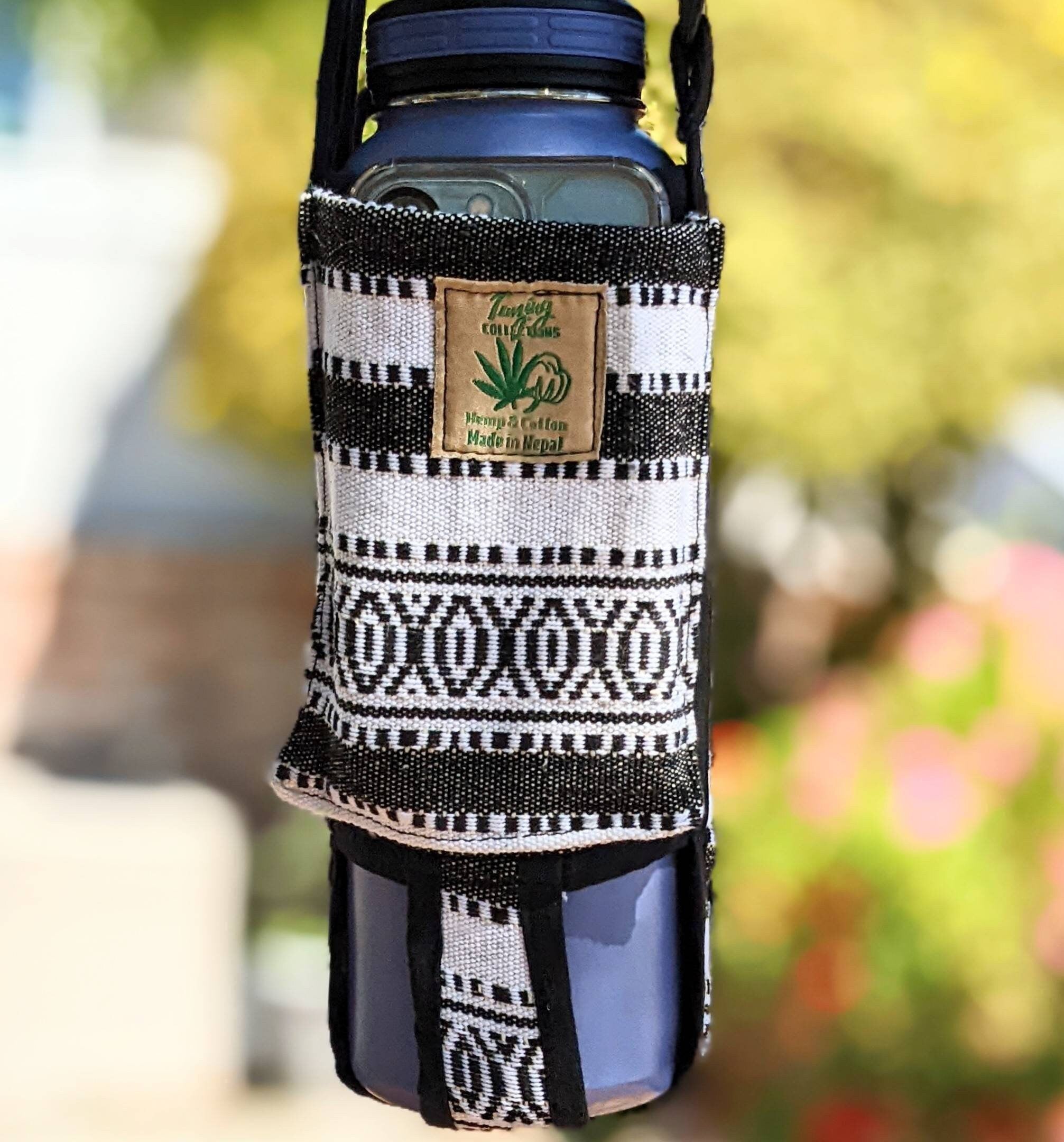 Water bottle holder and phone Pocket or small change Pocket