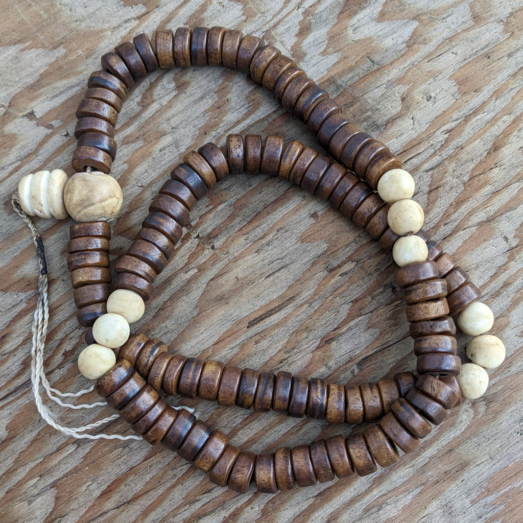Tibetan Yak Bone Mala Beads: 108 Prayer Beads with Conch Shell Spacer