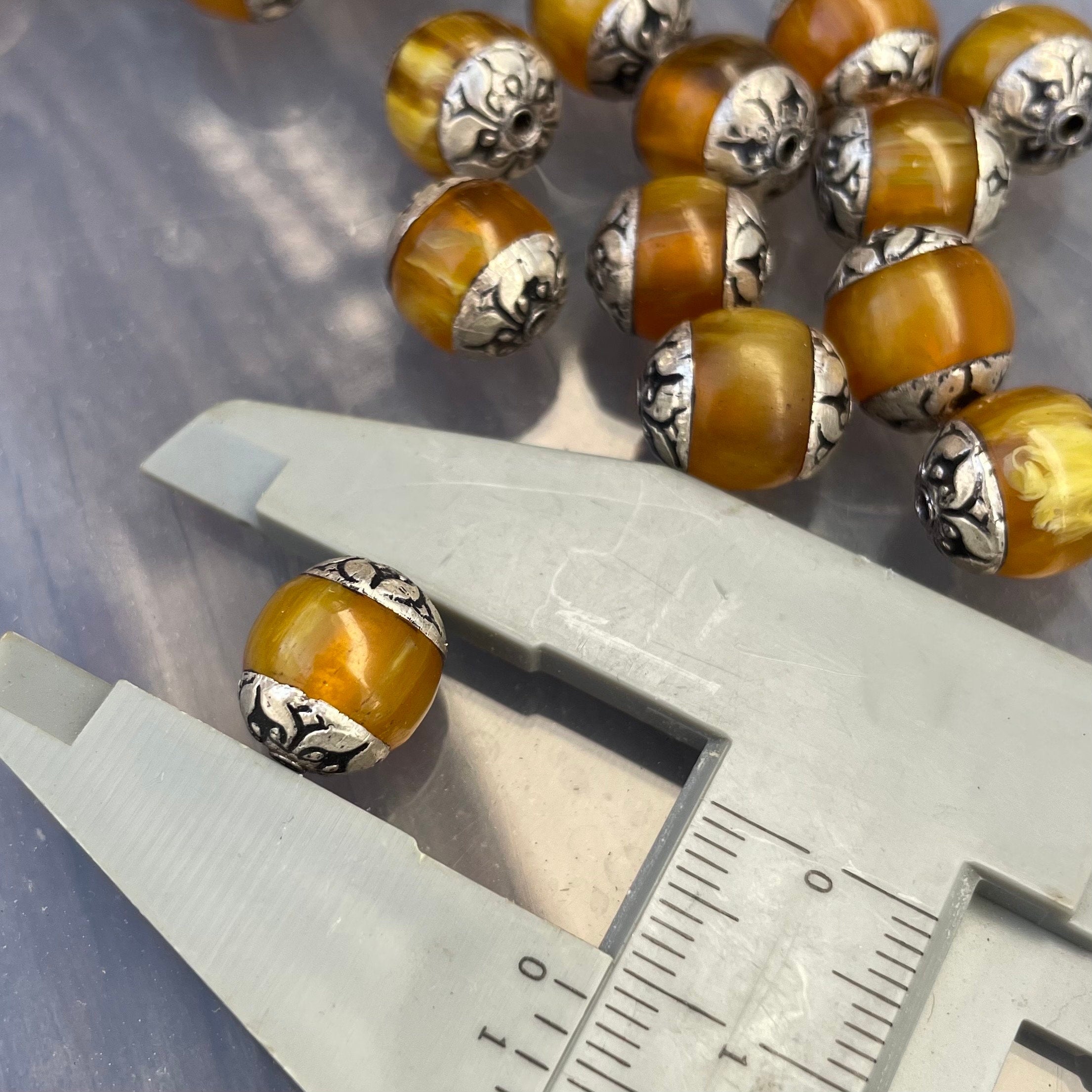 Handcraft Tibetan Amber Beads: Rice Bean Shape, Silver Cap (10 pc)