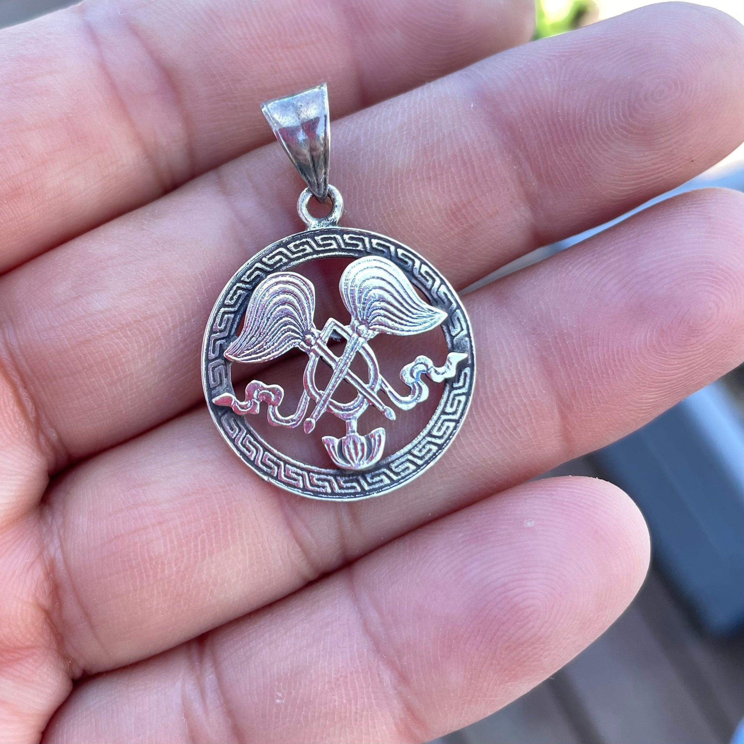 All-powerful Wheel:(Silver Pendant of Auspicious symbol) (T1102-004.9)