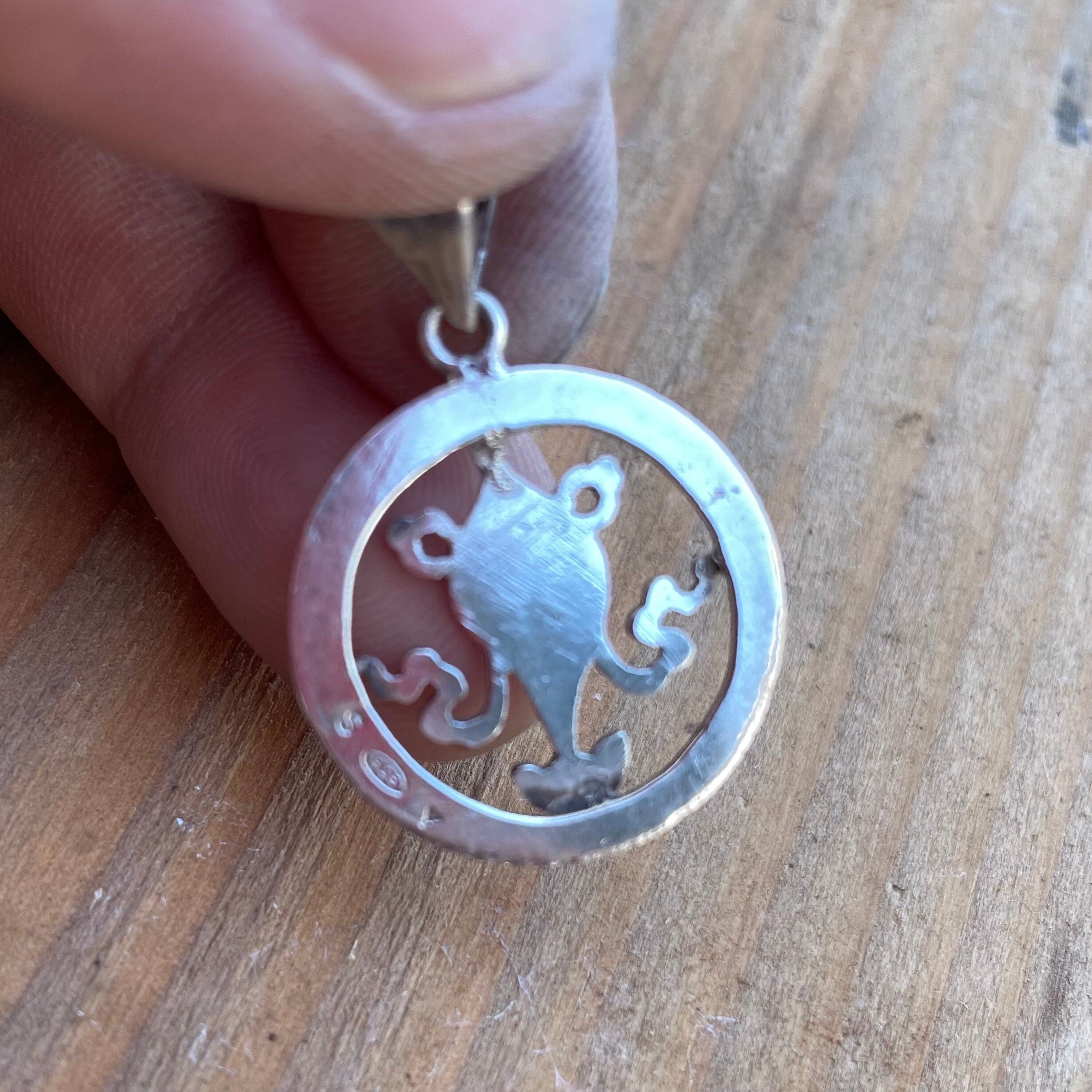 Conch Shell of Far Renown:(Silver Pendant of Auspicious symbol) (T1102-004.6)