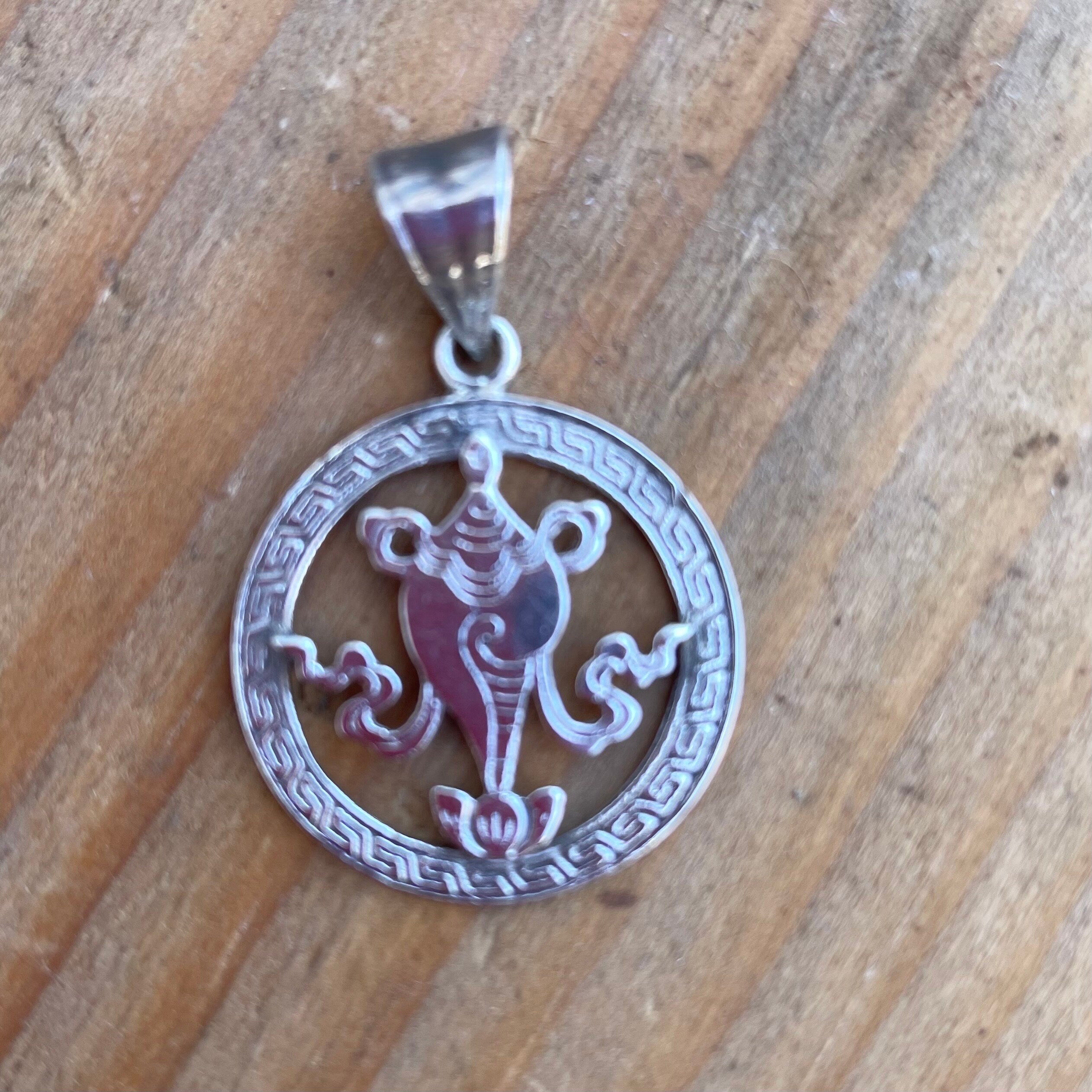 Conch Shell of Far Renown:(Silver Pendant of Auspicious symbol) (T1102-004.6)