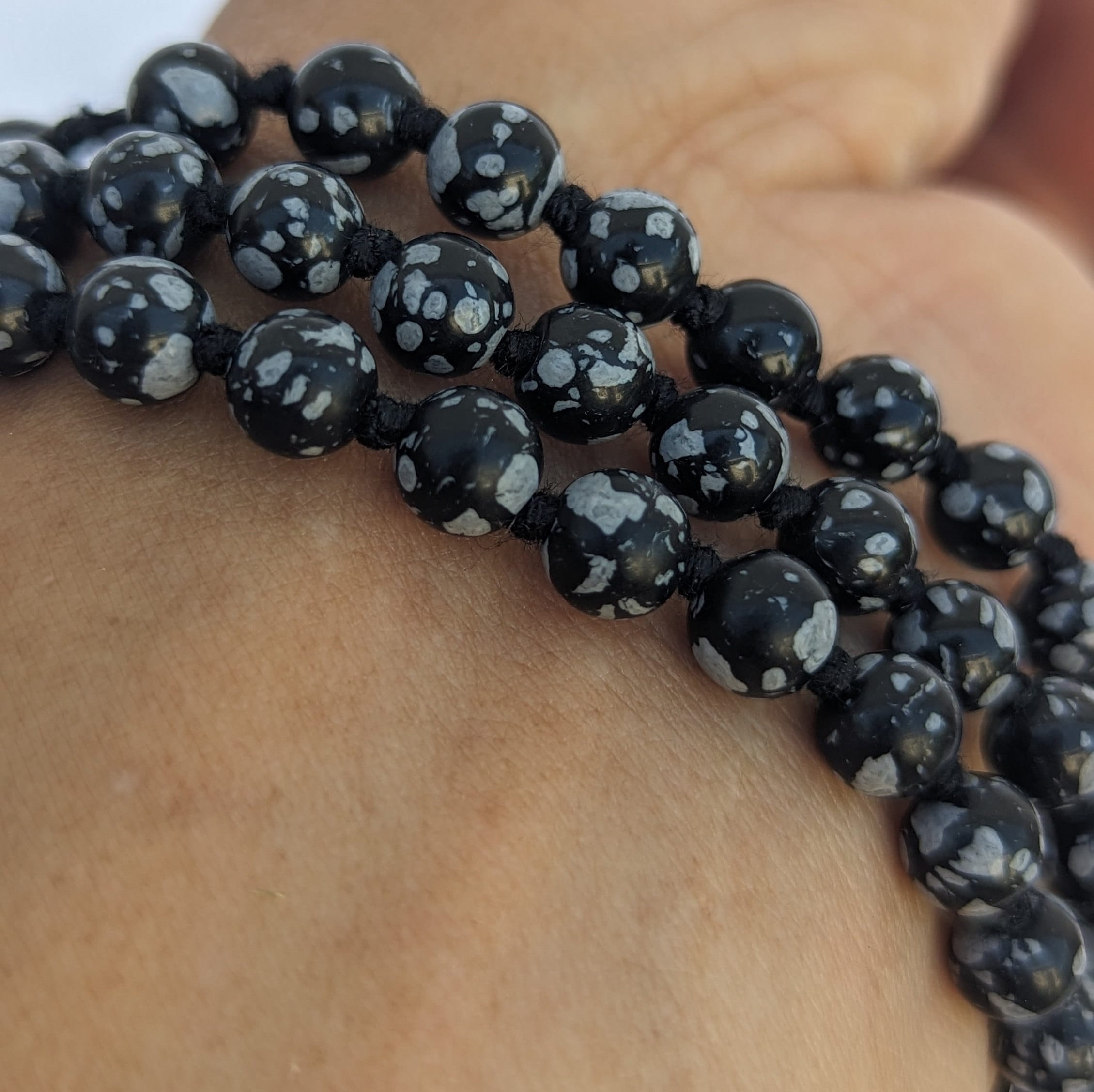 Snowflake Obsidian 7-Chakra Mala: Knotted Bead Meditation Necklace