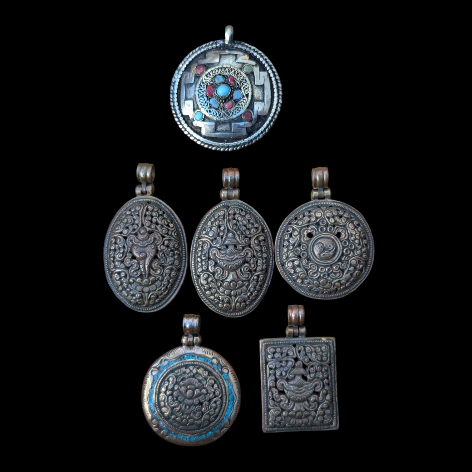 PE109 Tibetan Pendant Handmade in Nepal, this auspicious Buddhist pendant is a good luck charm.