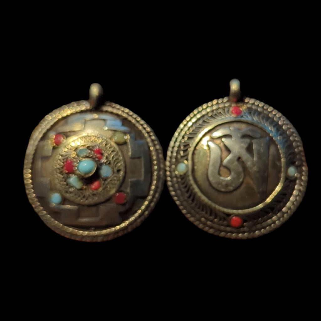 PE109 Tibetan Pendant Handmade in Nepal, this auspicious Buddhist pendant is a good luck charm.