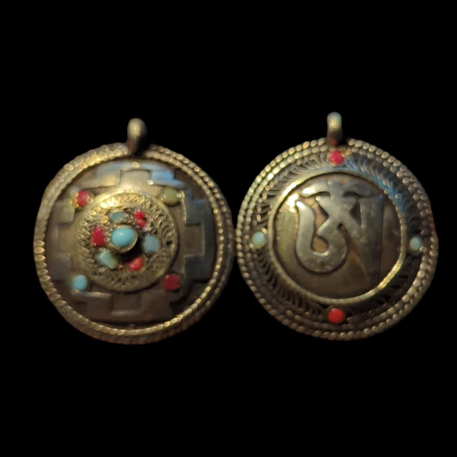 PE109 Tibetan Pendant Handmade in Nepal, this auspicious Buddhist pendant is a good luck charm.