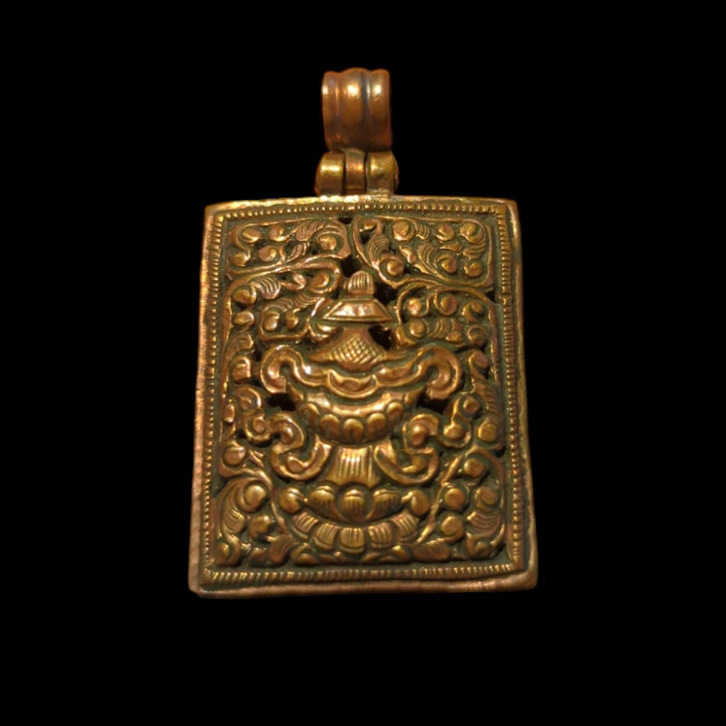 PE109 Tibetan Pendant Handmade in Nepal, this auspicious Buddhist pendant is a good luck charm.