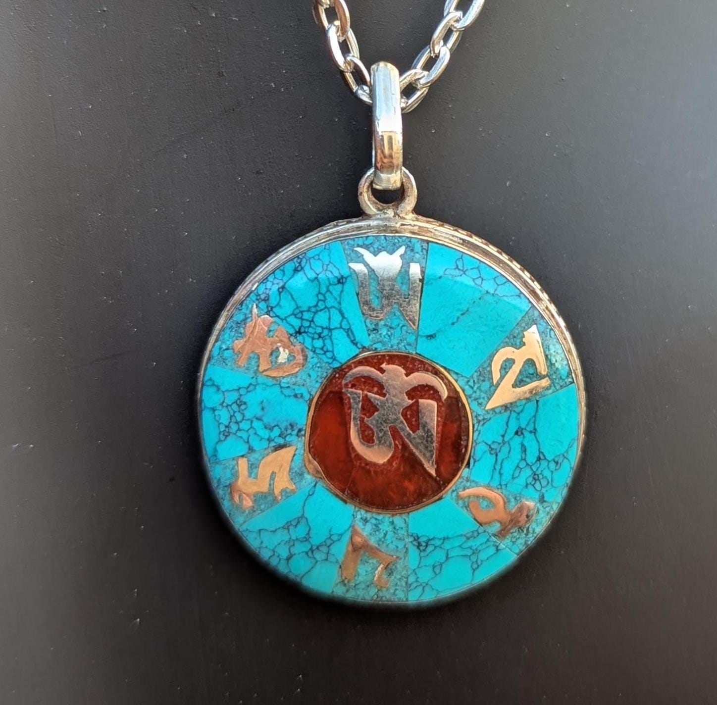 Om Mani Padme Hug, Buddhist Necklace Silver Pendant.(Central Om) (T1102-002)