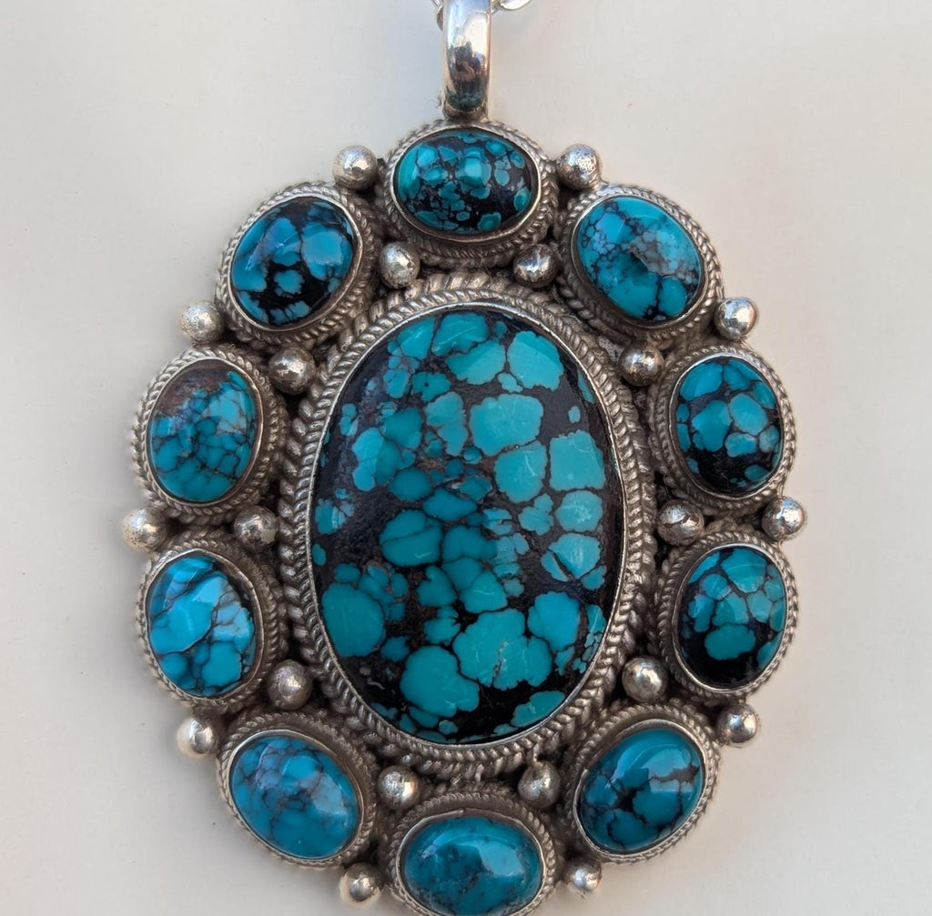 Women’s Enhanced Blue Turquoise 925 Sterling Silver Pendant .  (T1101-006)
