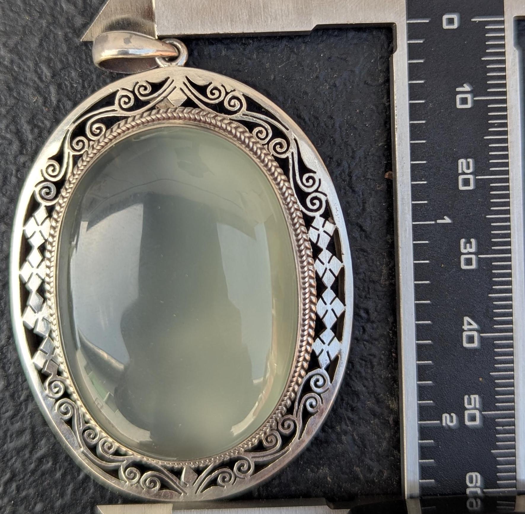 Handmade Moonstone Pendant: 925 Sterling Silver, Elegant Design