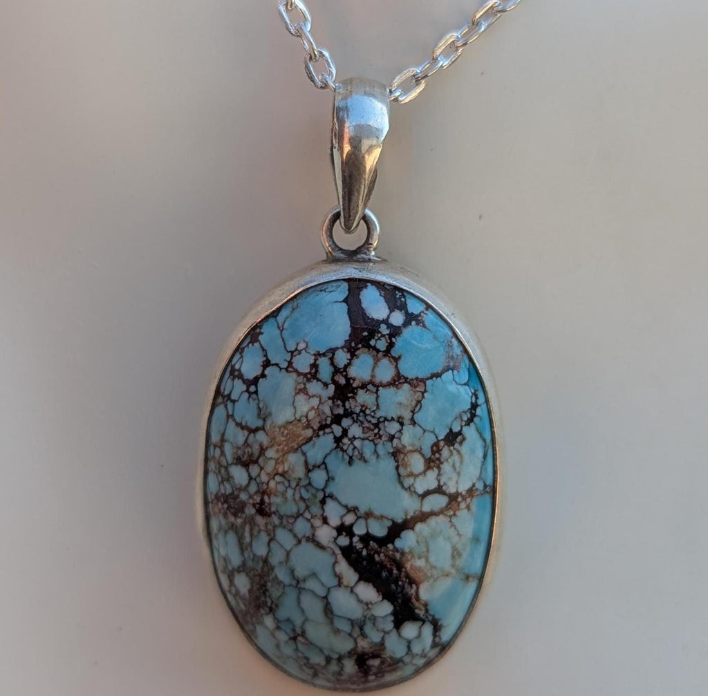 Women’s Enhanced Blue Turquoise 925 Sterling Silver Pendant.  (T1101-006.2)