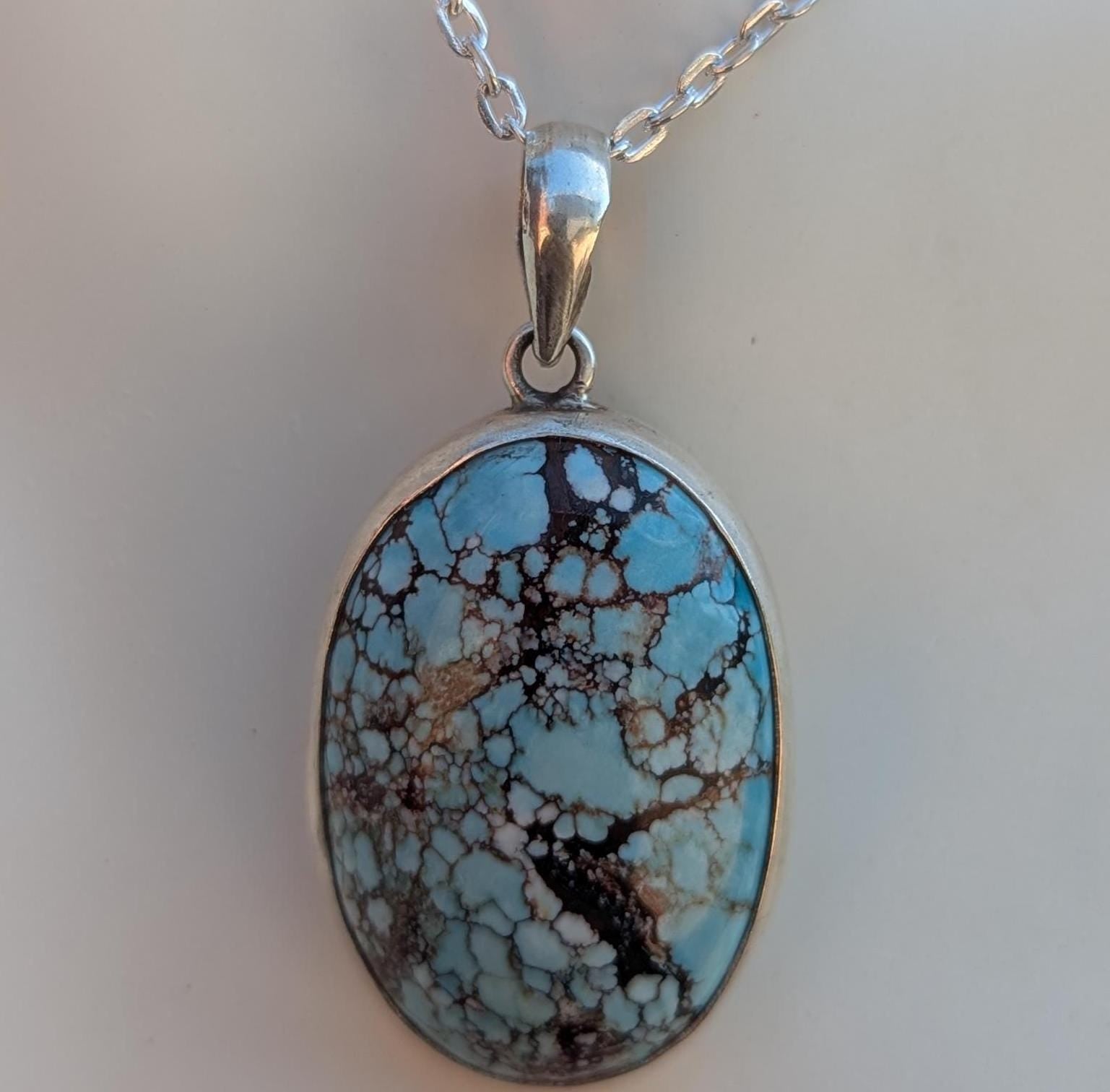 Women’s Enhanced Blue Turquoise 925 Sterling Silver Pendant.  (T1101-006.2)