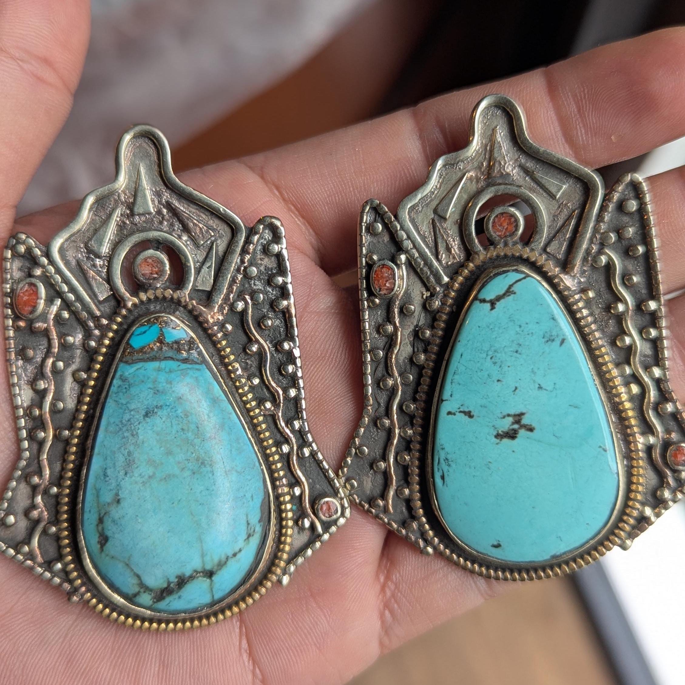 Tibetan antique ethnic pendant adorned with turquoise and coral inlays. (p6-002)