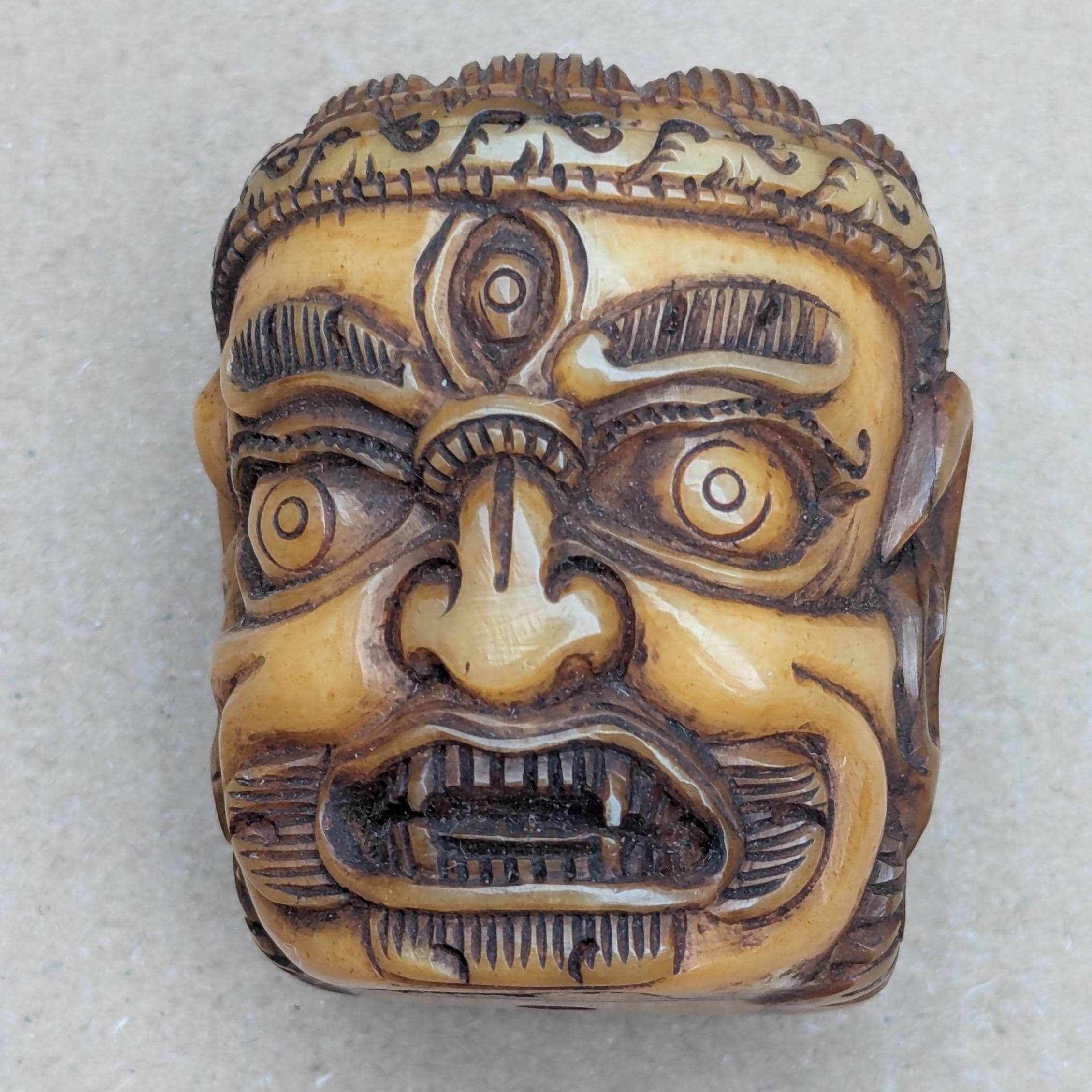 Antique Yak Bone Skull Bead: Hand-Carved Mahakala Protector Deity Pendant