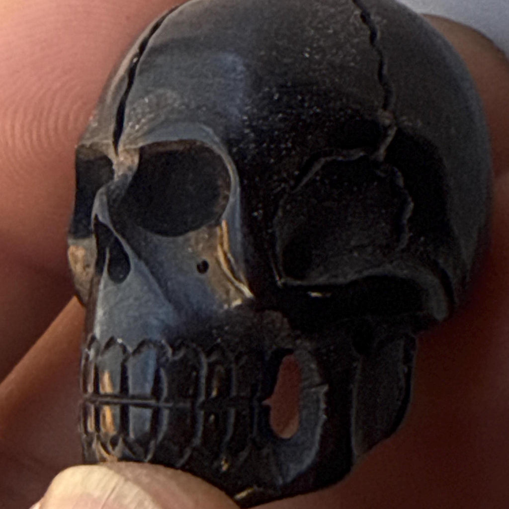 Hand-carved skull beads made from fine yak bones, a rare vintage item from Tibet