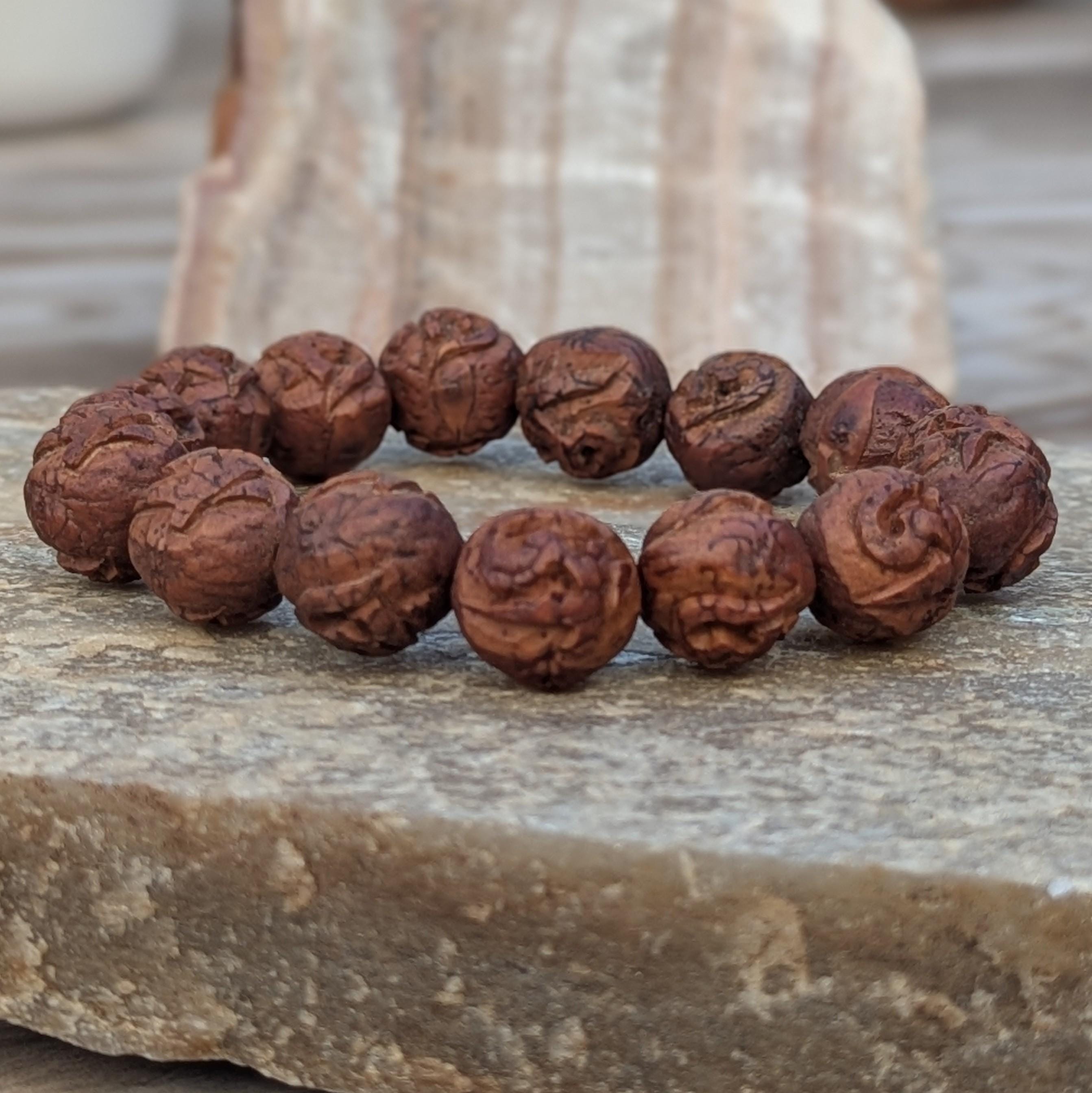 Beautifully carved Tibetan skull mala bracelet with amulet beads. (BM113)