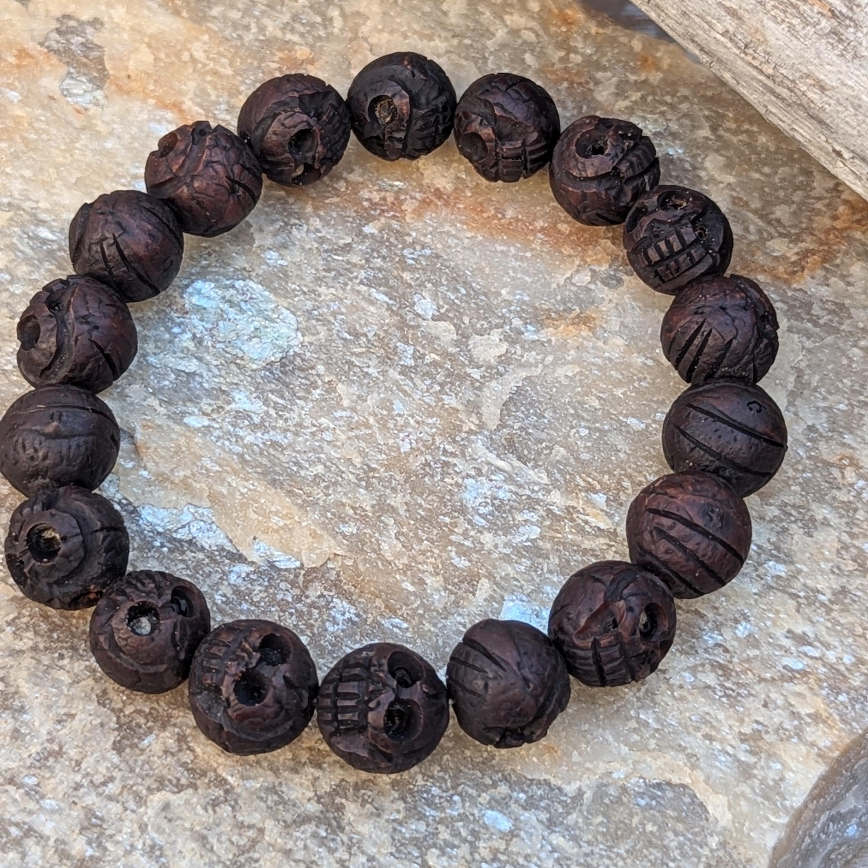 Beautifully carved Tibetan skull mala bracelet with amulet beads. (BM113)