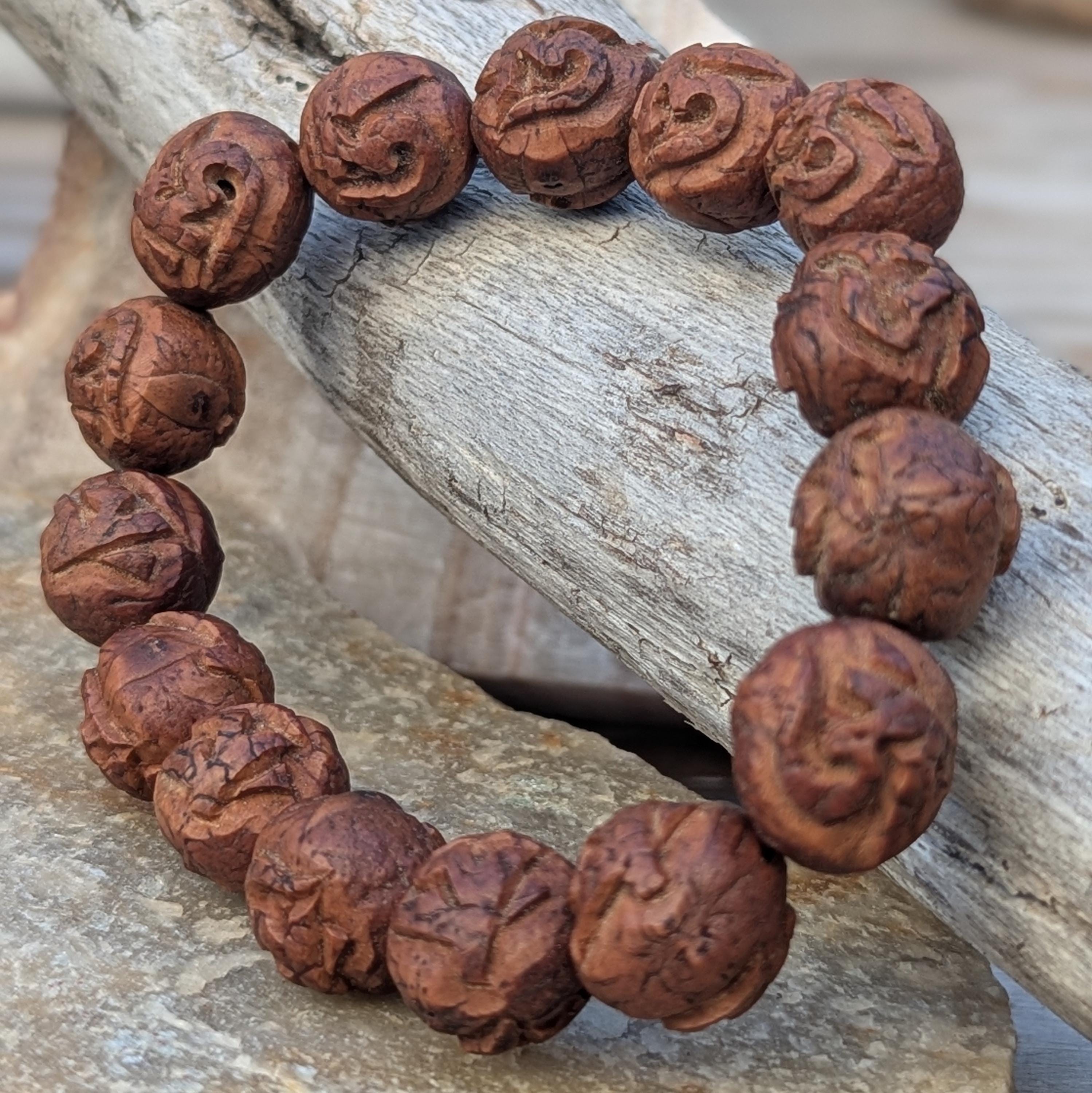 Beautifully carved Tibetan skull mala bracelet with amulet beads. (BM113)