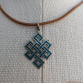 Endless-Knot Pendant with Turquoise from Nepal(T12-3/11) P5/11-